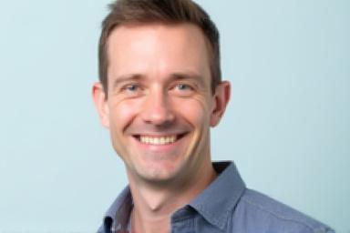 Professional headshot of Mark Thompson, a friendly man with short hair and a welcoming smile.